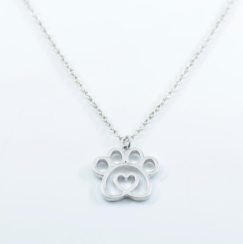 K900 Foreign Trade Hot Selling New Pet Footprint Pendant Hollow Love Dog Paw Necklace Jewelry Manufacturer Wholesale