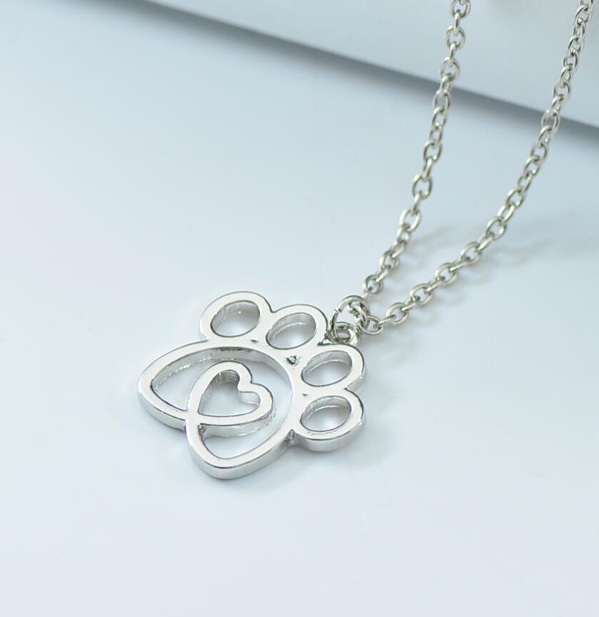 K900 Foreign Trade Hot Selling New Pet Footprint Pendant Hollow Love Dog Paw Necklace Jewelry Manufacturer Wholesale
