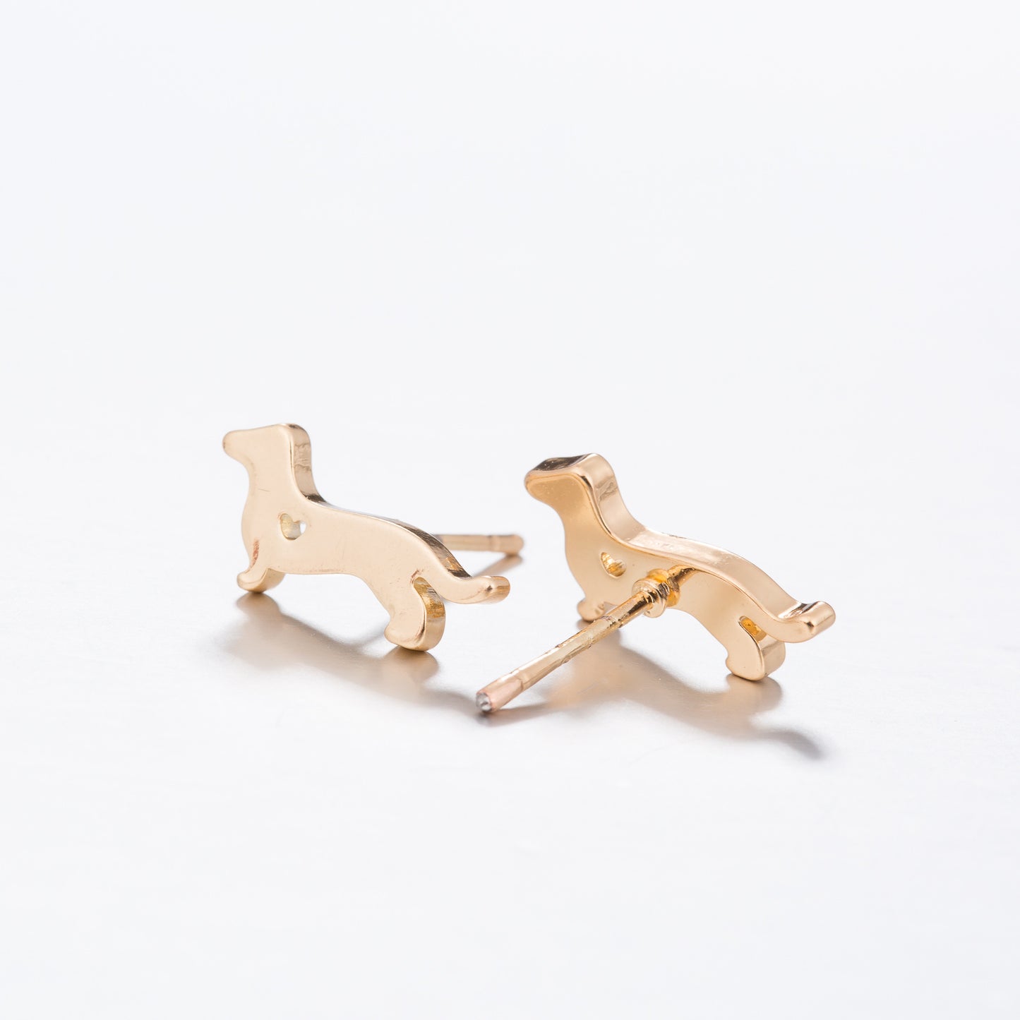 Hollow animal bantam stud earrings
