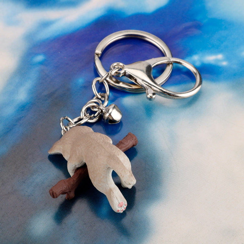 Keychain for holding tree branch cat doll
