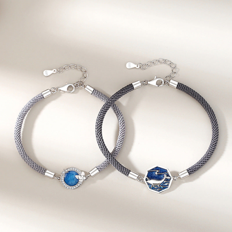 A Pair Of Whale Lovers Bracelets In Sterling Silver