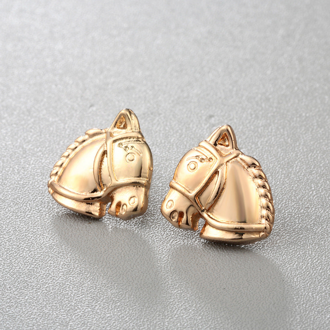 Mini horse head alloy earrings