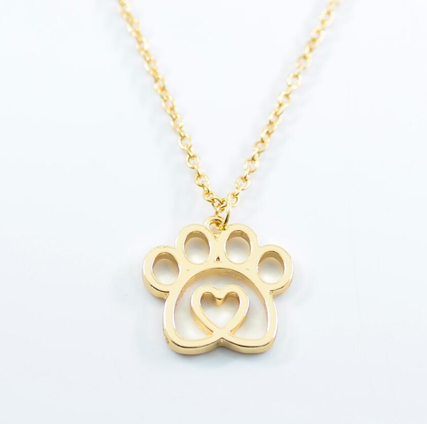 K900 Foreign Trade Hot Selling New Pet Footprint Pendant Hollow Love Dog Paw Necklace Jewelry Manufacturer Wholesale