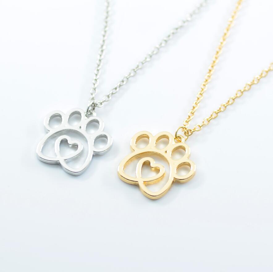 K900 Foreign Trade Hot Selling New Pet Footprint Pendant Hollow Love Dog Paw Necklace Jewelry Manufacturer Wholesale