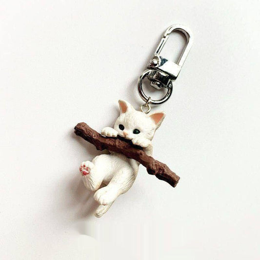 Adorable Kitten Brooch Holding Branches