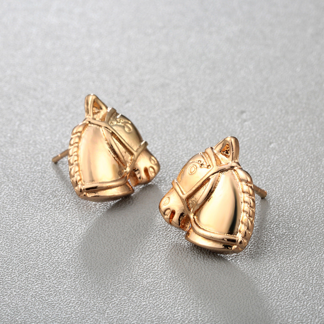 Mini horse head alloy earrings