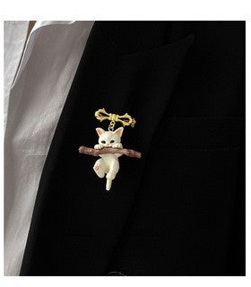 Adorable Kitten Brooch Holding Branches