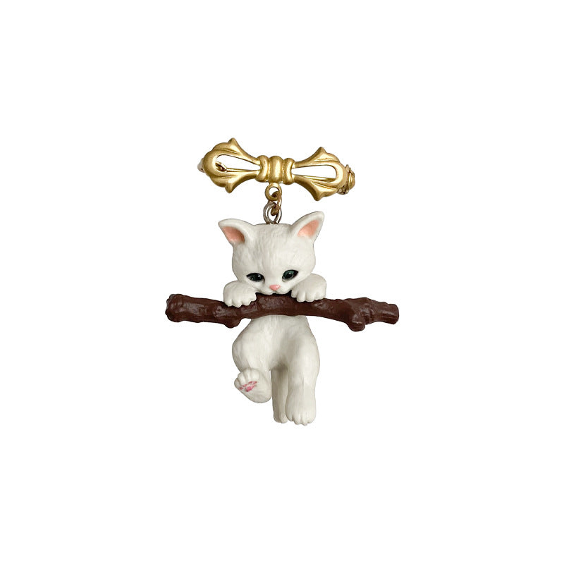 Adorable Kitten Brooch Holding Branches