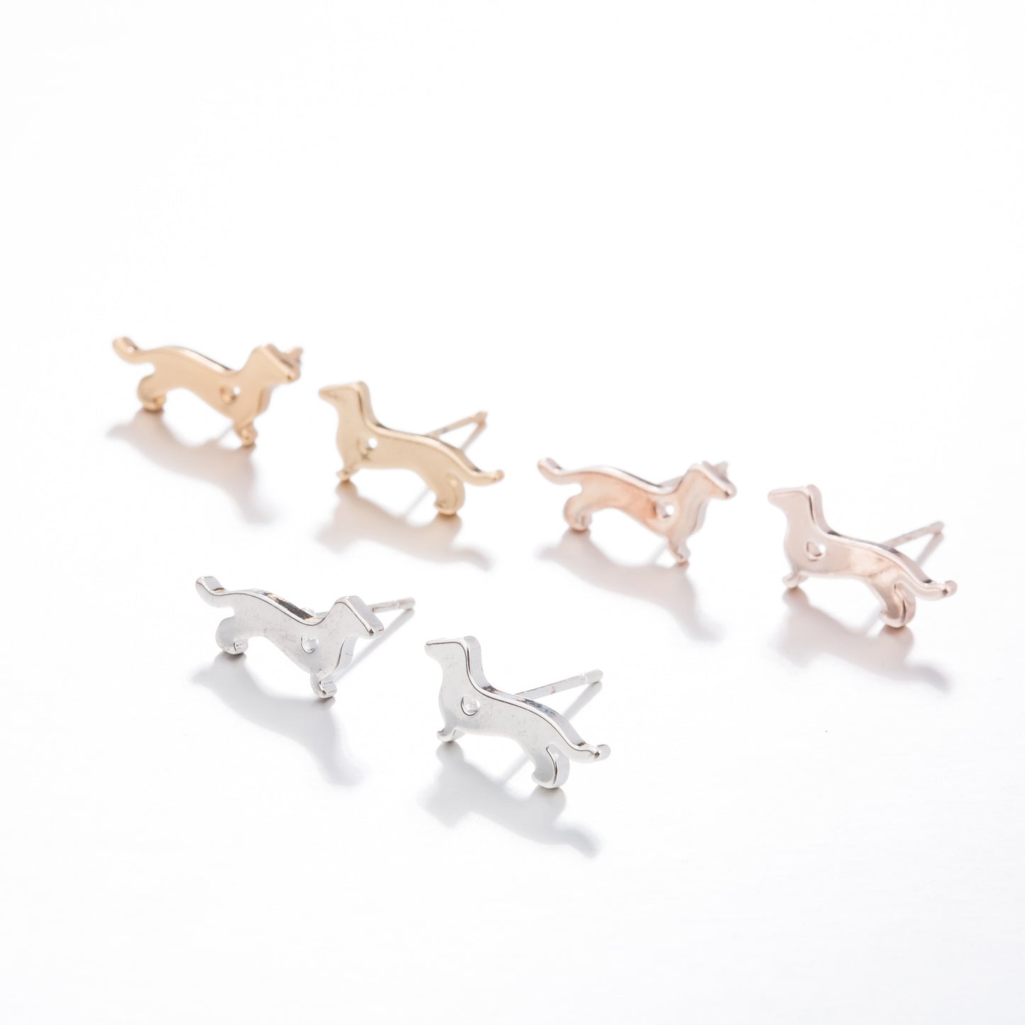Hollow animal bantam stud earrings