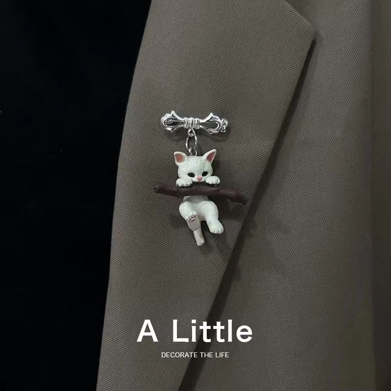 Adorable Kitten Brooch Holding Branches